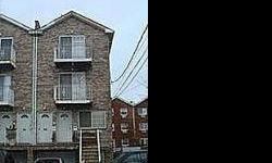 Beautiful 2 family house for sale *2 bedroom 1 bath with skylights and balcony. *3 bedroom 2.5 baths duplex with 2 balconies. AND *1 bedroom 1 bath suite with 1 car garage and driveway. Semi detached grassy yard. Built in 2005 block and brick