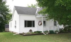 Cute white house for sell in Concordia Mo. House has a deck off the back of the house, a shed in the backyard and a carport off the side of the house. The inside is very modern and recently redone with 10' ceilings in all rooms but the 2nd bedroom. The
