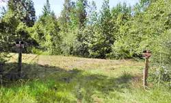 Very nice parcel, 10 acres, for building or placing a mobile home. This wooded parcel has plenty of large and small scattered trees, oaks, pines, cedars, the property has a very nice slope to the road and would make a great homesite, or a mini-farm, there