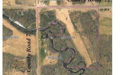 Corner lot on the Rum River. 30 Acres with paved road on 2 sides. Mix of heavy woods & tillable ground. Great building site or hunting ground.Listing originally posted at http