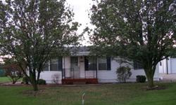1250 sq. ft. home with 3 bedrooms/ 2 bath. Central hearing/air. Has all new floors (kitchen has heated floor), one remodeled bathroom, washer, dryer, applieances included. Has large back deck. Sits on 1/2 acre lot. Has 40x40 steel structured shop with
