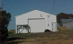 Large metal shop on 5.55 acres with water and power on property. Lots of lawn and trees. Put a house on land. Perfect spot in Mansfield.
Listing originally posted at http