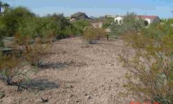 1.1 Acre lot with surrounding mountain views. North South Exposure, paved roads. Many homes have already been built in the area and appear to be million plus dollar homes. Easy access to shopping, loop 101 just a few miles away and so much more. Just
