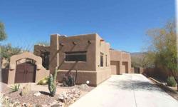Stunning property w breathtaking views! Huge premium view lot backing to Equestrian Trail & surrounded by the Superstition Mountains! Beautiful tiled front courtyard w Vega's & latillas, private w arched wood entrance door! A tall steel, wood & glass door