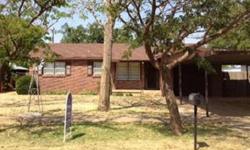 EXTREMELY well cared for home, located in Slaton, just 15 minutes south of Lubbock's S Loop 289. Top notch quality and components. Large manicured lawn, front and back. There is a well for the lawn, no restictions. In addition to the large work shop,