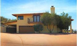 This Top of the Mountain Desert Hills Estate is situated on 2.99 acre lot with level driveway, flat usable yard and large diving pool. This 3 bedroom 3 bath Top of the mountain estate home for sale has 2 other rooms for library, den or office. This Desert