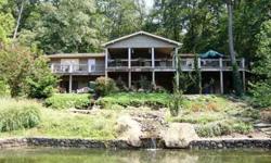 This beautiful waterfront home is situated on 1.2 +/- level acres with 450 +/- feet of water frontage and has exceptional outdoor living areas with access to the oversized decking from the dining area, great room and master suite. This is a 3 bedrooms / 4