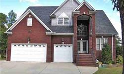 COME HOME EVERYDAY TO WATER IN THE BACK YARD AWESOME HOME WITH 5BR 4BA CUSTOM HOME ON SKI LAKE W/BOAT LIFT.HWD,MARBLE,TILE,CARPET.CAROLINA RM FOR ENTERTAINING FRIENDS/FAM.ALL BRICK/VINYL SOFFITS.ONE OF KIND FIND FOR LAKE FAMILY W/SHADED SUNSET.GREAT
