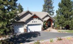 Custom Daylight Craftsman on over 1 acre in the Broadmoor Estates. New granite slab counter tops and custom stone tiled backsplash. 2nd bedroom on the main floor is an office with closet area. Vaulted great room with floor to celing windows. Formal