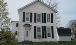 Older country home right in town! This 5 bedroom, 2 full bath home is sold 'as-is'. Newer vinyl exterior. New furnace, hot water heater & fuse box. Good sized rooms, newer vinyl windows. Home needs some cosmetics. A great buy for residence or rental