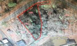 Waterfront lot in Fairway Shores with 2 bedroom septic permit. Cove lot with very gentle slope to the shoreline. Lot qualifies for a boathouse with waterfront lease.Listing originally posted at http