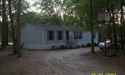 Very clean well-kept 4bdrm/2bath doublewide mobile home. Spacious kitchen/dining room area and living room. Good sized bedrooms. Master w/bath and walk-in closet. Sits on acre of land in peaceful neighborhood.