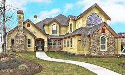 Beautiful custom home w/ birch hardwood floors, gourmet kitchen w/ custom rustic cherry cabinets, built-in desk & butlers pantry. Main level guest room w/ full bath. Master has travertine/slate walk-in shower & attached exercise room. Dramatic staircase