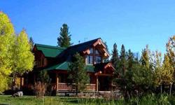 Nestled in an aspen grove overlooking your pond this three bedroom (plus an office), two bath log home is just 10 minutes south of McCall, Idaho. Heated Saltillo tile floors, granite countertops and a Wolf range are just a sampling of the upgrades this