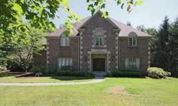 Meridian-Kessler estate style home in Washington Township! 1.25 ac beautifully landscaped acres leading to creek. Deck and balcony overlooking tennis court. Dramatic 2 story entry. 2 story great room with huge FP and beautiful bar (37x33). Cozy library