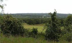 +/- 11.65 acres - Southern Wise County Property is located near Paradise just West of the DFW Metroplex. The property has paved county road frontage, heavy oak cover, excellent views, and great building sites. Electricity is in place and water is