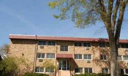 Carefree living! Just move in, 2 bedroom 3rd floor unit. Assigned parking space in rear of building. New carpet,vinyl,paint and appliances, security building, convenient South Minneapolis location. Local bank-fast decisions. Sold as-is. No warranties.