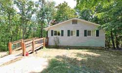 Nice 2 bedroom home sitting on two lots, has vinyl siding and a nice deck. Room in lower level could be sun room or 3rd bedroom. Needs some TLC. Two large community lakes and a swimming pool for owners.Listing originally posted at http