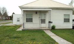 This little cutie has much potential! It has hardwood floors in much of the main floor. Main floor laundry. And tons of storage space. The basement is mostly storage, but can be converted into useful space. Corner lot and an established lawn. Make an