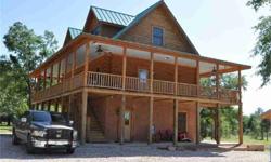 Terrific 47+ acres w/3 story log home built by Langcamp Custom Homes,nicely furnished,wrap around porches on 1st & 2nd levels,spacious den,beautiful stone fp,surround sound home theater,gourment kitchen w/island,granite,cherry cabinets,jenn-aire