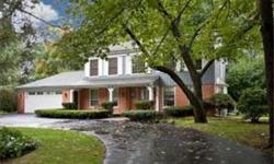 Cntr Entry Colonial w/ 2 sty Foyr & main flr BR w/full BA. King's Cove loc on premier wooded lot . Kit remod w/gran cntrs, SS appls, w/i pntry, dsk & lg Brkfst rm which ovrlks FR. Huge FR w/2 sets of sliding glass drs flanking both sides of stone fpl.