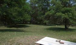 Older (1977) mobile home on 2.5 Acres. Lots of trees, well & septic. Quiet, country living. Driveway is an easement on 48152 & will switch to a new road once land behind is developed. Trailer sold as it. Sand point well. New furnace in 2010. The lot is on