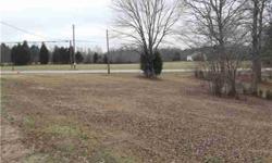 1.7 acres zoned RS20, county water available. Could be divided into 2 home sites. Corner lot with several mature trees. Buyer to perc test before closing. Tax value is for entire 5.8 acre tract and existing home - seller will survey off the 1.7 acre