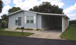 This home is the ?youngster? of the neighborhood being much newer than most of the others in Spanish Trails Village. Consequently, this 2 bedroom/2 bath 1998 Palm Harbor double-wide has many features that you will love, like its more modern design,