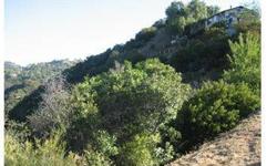 Raw un-entitled hillside acre of land zoned for residential development in addition to a cul-de-sac entry. 1 whole acre of land. R1 zoned vacant land in the Calabasas Hills, Malibu & Mulholland Hwy vicinity. Great for a hiking getaway home! 561 Old