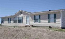 2001 manufactured home situated on 35 acres in Sunrise Trails -home includes 3 bedrooms, 2 baths, open country kitchen/dining area, living room with fireplace. BRAND NEW ROOF - new paint and lots of recent work......ready to move into. Real
