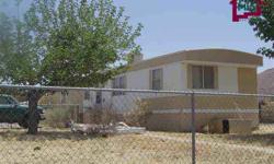 HOME FEATURES SPLIT BEDROOMS BOTH WITH FULL BATHS. EAST BATHROOM HAS A GARDEN TUB AND SEPARATE SHOWER, LOTS OF BUILT INS - GARAGE -CARPORT-STORAGE SHED AND A WORKSHOP WITH ELECTRICITY. CHAIN LINK FENCE ALL AROUND AND SIDEWALKS TO THE STORAGE SHEDS AND