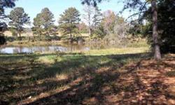 9.68 Acres of open rolling land plus some trees and a pond view for a great building site.Listing originally posted at http