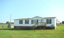 Country living! Spcious 3 bedroom 2 bath home, all appliances remain including refrigerator, washer & dryer, large kitchen w/new vinyl flooring, eat in kitchen, master bath has garden tub & shower. All furniture remains except bedroom furniture. Storage
