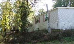 Large doublewide with 5bdr/three bathrooms- lr, dr, kit/den combo with wbfp on approximately. This Pearcy property is 5 bedrooms / 3 bathroom for $65900.00.Listing originally posted at http