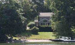 Make this level waterfront Colonial your new home. Sandy beach, long lake views, open floor plan with chef's kitchen and loads of natural lighting!Listing originally posted at http