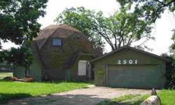 Seldom seen geodesic dome home 2100 square feet, set on large corner lot on dead end street. 3 bedrooms and one and a half baths, full basement Sold in "AS IS" condition. Great project for investors. Cash buyer preferable. 2 car detached garage. Not a