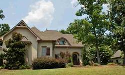 Short Sale opportunity on this energy efficient home of former luxury builder. Gourmet Kitchen with soaring ceilings & Juliet balcony overlooking; lovely screened-porch off Breakfast Nook; Master and Guest suite on Main; private and wooded backyard;