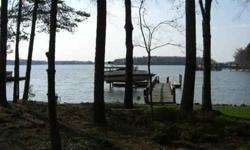 This waterfront lot in Lookout Point has gorgeous, open sunset views of Lake Norman. This lot, with mature landscaping, already has a new pier that was rebuilt in 2011, and a new driveway. The lot has an existing septic system for a three bedroom home