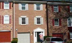 Easy living! That's what you will find in this well maintained, all brick, garage townhouse. Open LR/DR w/HW flrs, crown & chair moldings for elegant entertaining. Spacious eat-in kitchen updated w/stainless appliances. New windows to let the sun shine
