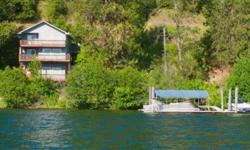 Multi story lake home on driftwood point. Lake views from all three stories. Tom Craig is showing this 3 bedrooms / 2.5 bathroom property in Harrison. Call (208) 667-2399 to arrange a viewing.