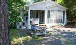 Nice park model with two bedrooms and a covered porch.Listing originally posted at http