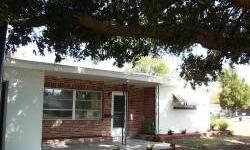 This is a rare 3 bedroom, 2 bath, 1 car garage block home with owner financing available!Listing originally posted at http