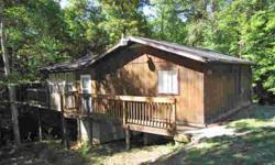 Nice 2BR, 1BA cabin. Spacious living room with large deck overlooking wooded lot. Great for a weekend home.Listing originally posted at http
