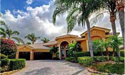 Spectacular home in sought after Boca Raton community offers Saturnia marble floors, stunning gourmet kitchen with top of the line applicances, beautiful baths, luxurious master suite, resort style salt water pool with summer kitchen and bar, state of the