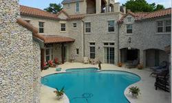 You won't believe your eyes when you experience this one of a kind Croatian style beauty. This incredible home features an attached guest house. Main home is 3-2.5 bth w-3 lvng areas & exercise room. Rooms overlook private courtyard-pool. Attached guest