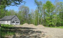 Prepped and ready buildable 2.45 acre lot w/200 ft of road frontage. Includes oversized 2 car garage. New 1000 gallon 3 bedroom septic system, city water, and underground electrical hook-up. Quiet location with easy access to I-95. Driveway in place.
