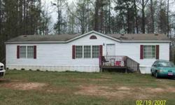3 BEDROOM 2 BATH MOBILE HOME WITH BONUS ROOM OFF MASTER, HOT WATER HEATER 2 YRS OLD,NEW METER BOX AND NEW FANS/LIGHT FIXTURES,MUDROOM AND REAR DECK, PROGRESS ENERGY, ON ALMOST AN ACRE OF LAND, NO CITY TAX!!