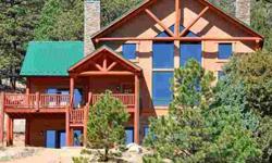 A Colorado custom built log accent home on 45 acres with Pikes Peak views from the master bedroom, deck, and family/great room. ? mile gravel drive off County Rd 1 winds through Ponderosa Pine and Aspen, around rock formations, past the fire pit with