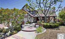 FULLY APPROVED SHORTSALE; BUYER WALKED. This dramatic Tudor style home boasts magnificent upgrades & spectacular views! When you enter, you will find intricate woodwork, dual paned Pella windows, zoned air conditioning, and a gourmet kitchen complete with