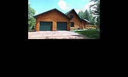 Situated on the end of a peninsula on Moon Lake sits this gorgeous Golden Eagle Log Home! Spectacular lake views from every single window with nearly 500' of sandy shoreline surrounding the property. Majestic great room with floor-to-ceiling windows, a